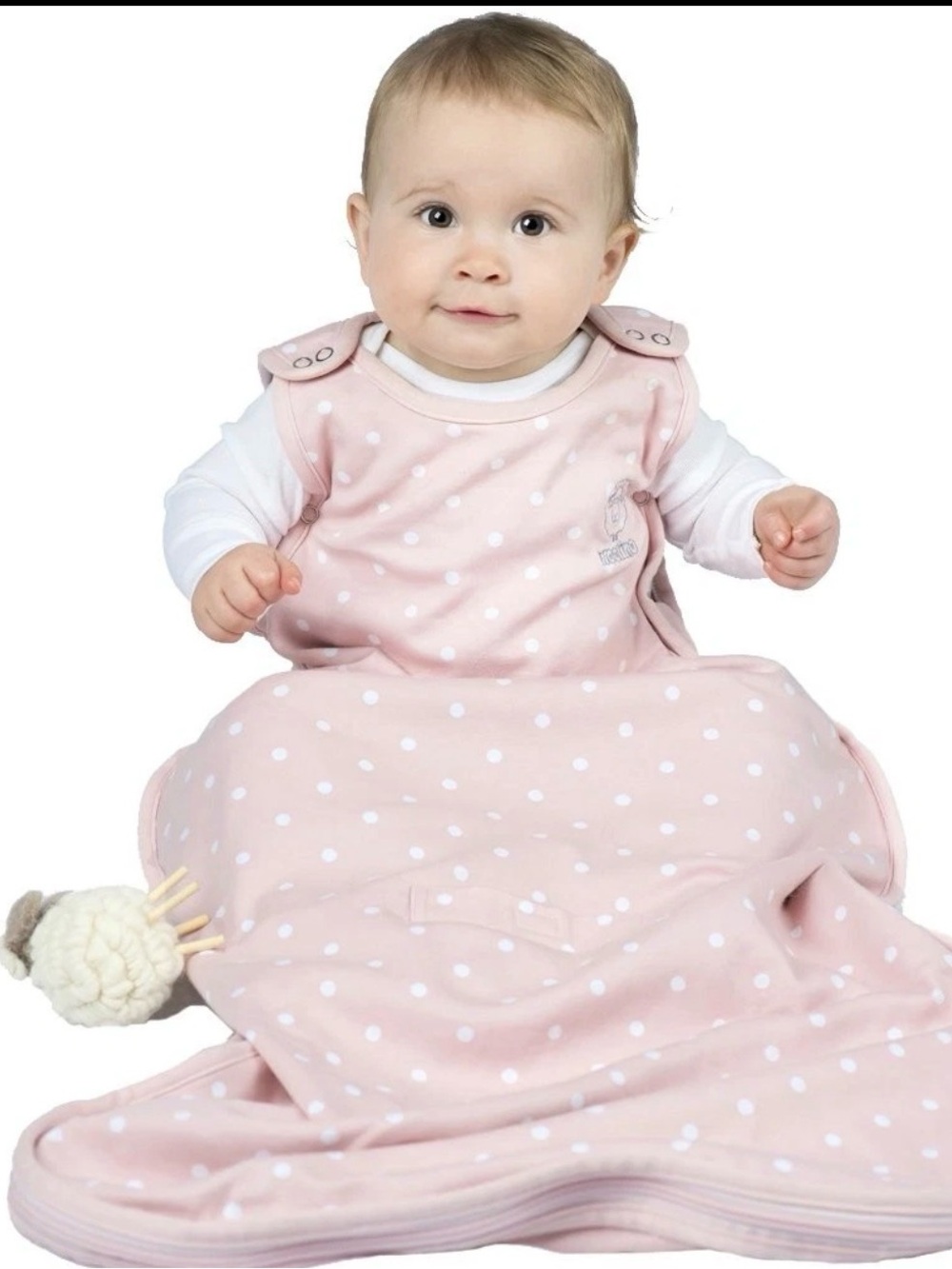 Woolino 4 Season Baby Sleeping Bag in pink with a polka dot pattern